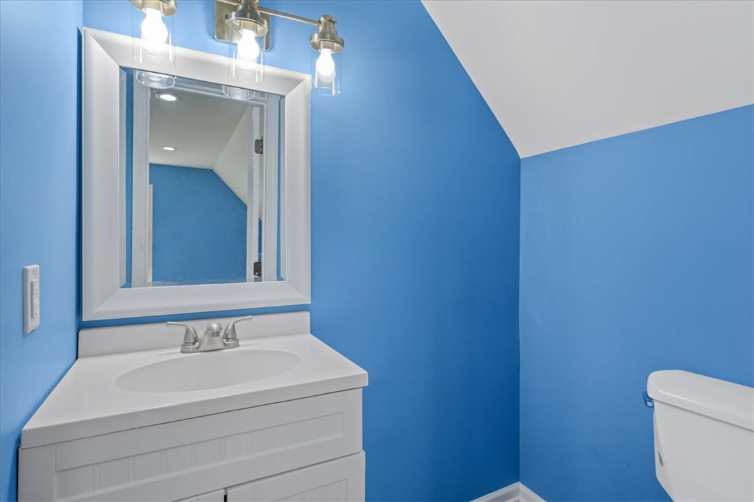 210 Briarcliff Road Central, SC 29630 - Photo 22 of 39 This bright bathroom features a modern vanity and mirror, creating a fresh and inviting space.