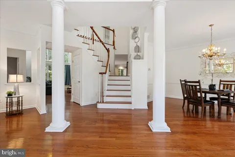 a view of a livingroom with furniture and wooden floor