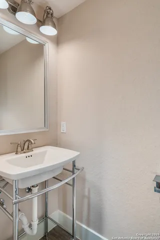 a view of room with window and wooden floor