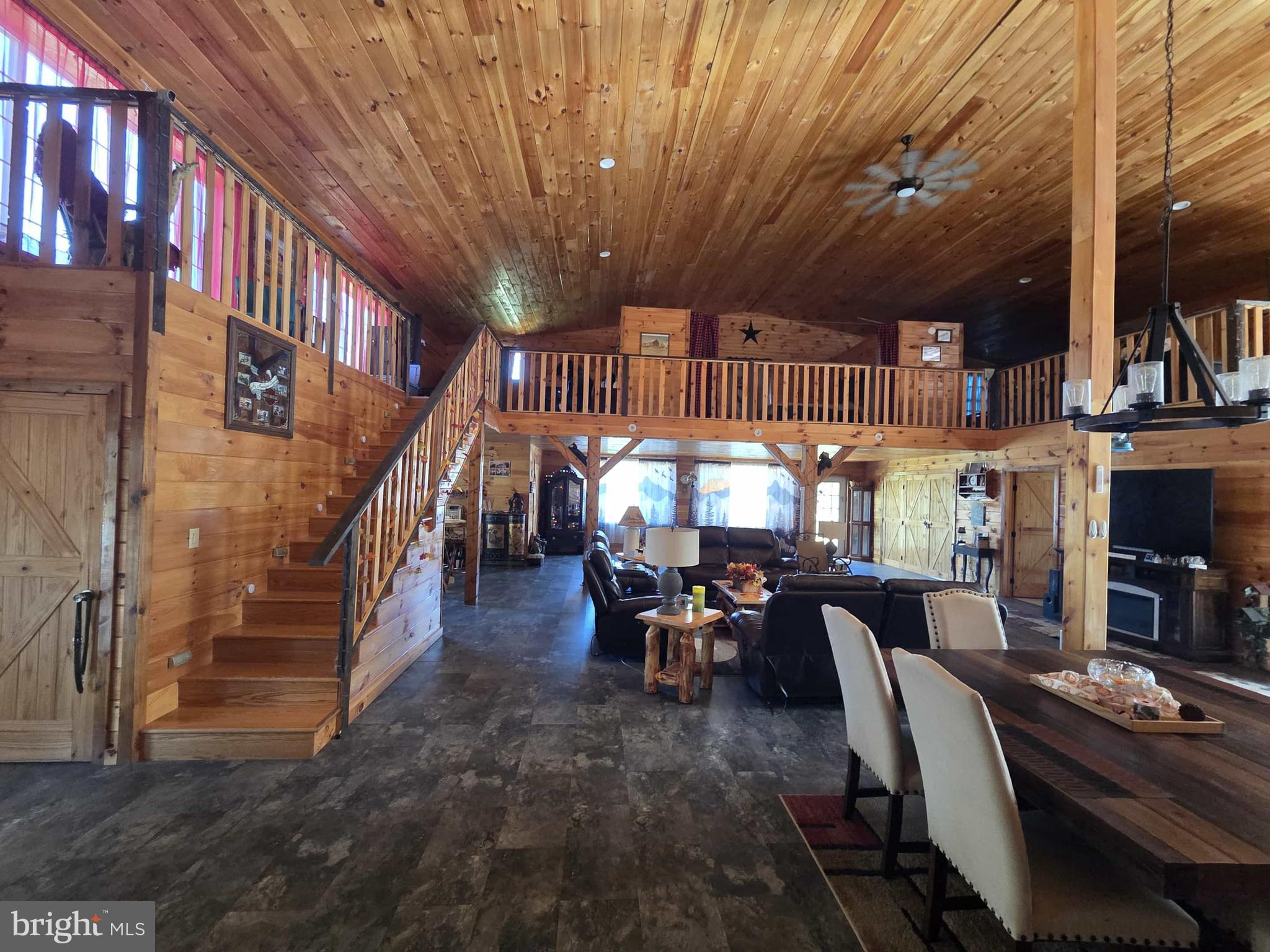 198 North Hunter Run Road Howard, PA 16841 - Photo 69 of 69 a view of a dining room with furniture chandelier