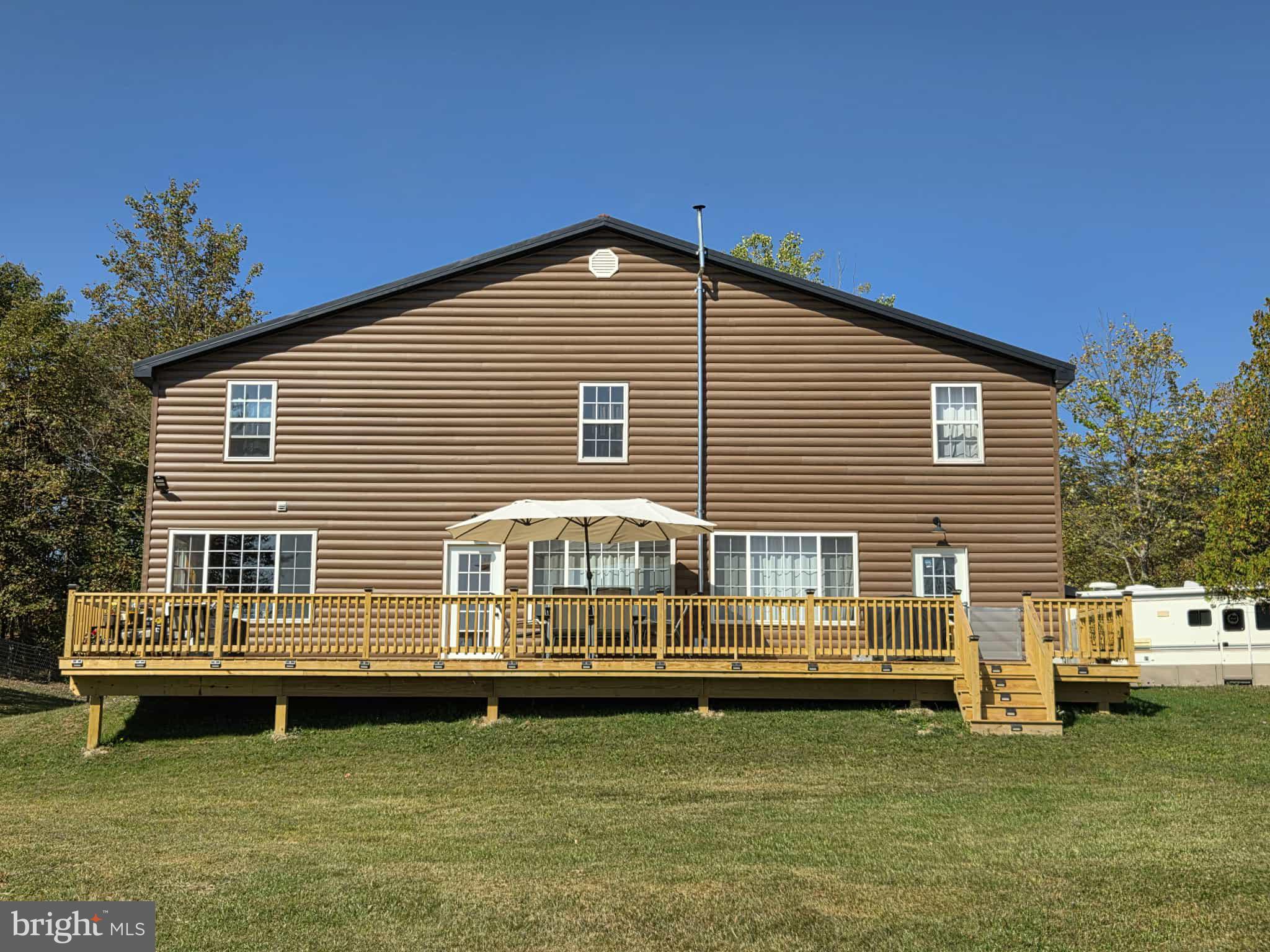 198 North Hunter Run Road Howard, PA 16841 - Photo 4 of 69 a view of a house with a swimming pool