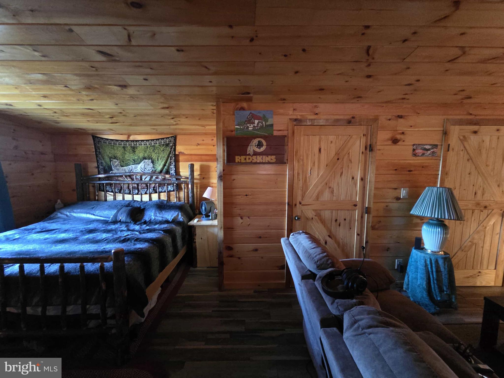 198 North Hunter Run Road Howard, PA 16841 - Photo 41 of 69 a dining room with furniture and wooden floor