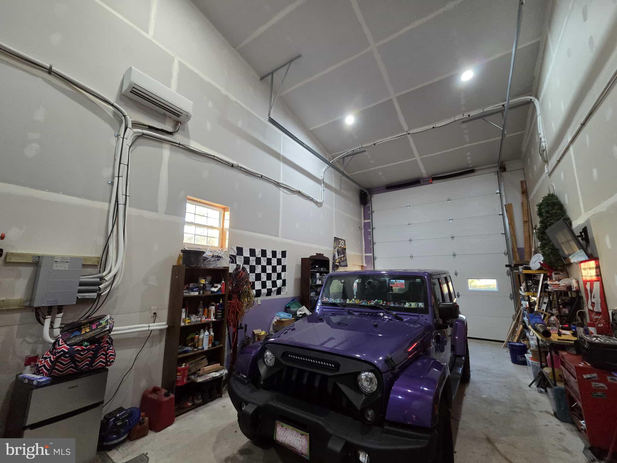 198 North Hunter Run Road Howard, PA 16841 - Photo 48 of 69 a large room with lots of chairs and a chandelier