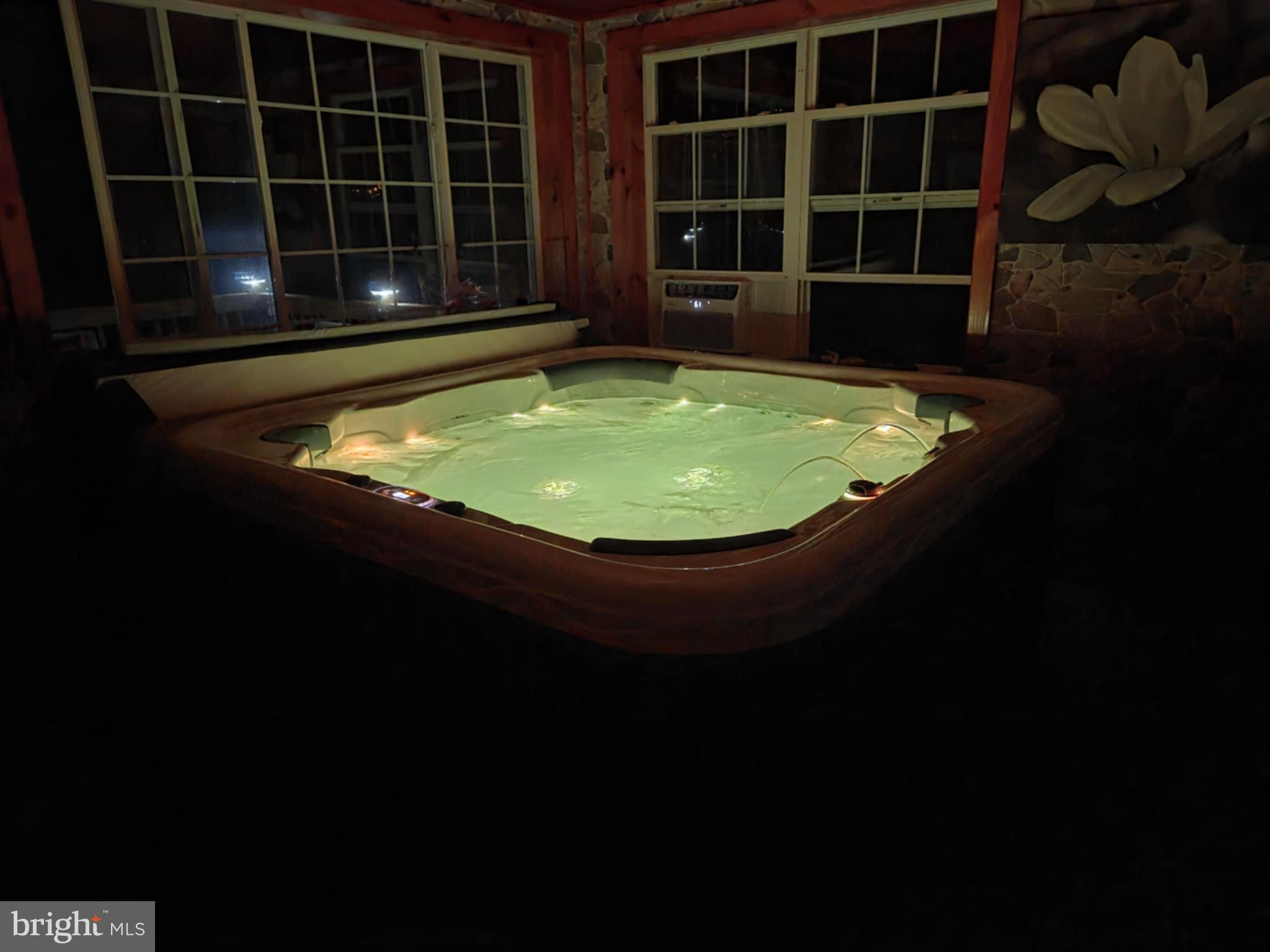 198 North Hunter Run Road Howard, PA 16841 - Photo 56 of 69 a view of a swimming pool with a table in a pots