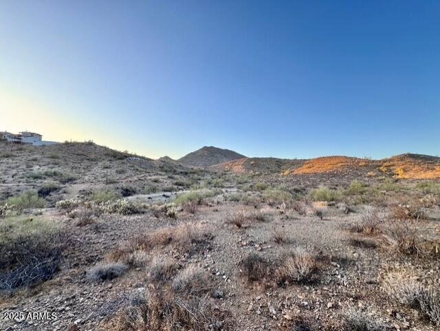263-xx North 5th Street Phoenix, AZ 85085 - Photo 15 of 16 a view of a mountain range with trees in the background