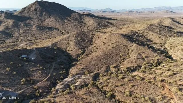 a view of mountains and valleys