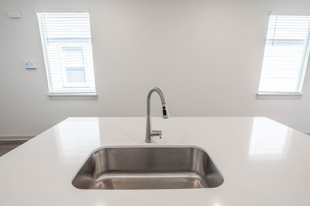 225 New Hampton Way San Marcos, TX 78666 - Photo 12 of 34 a close view of sink and tap