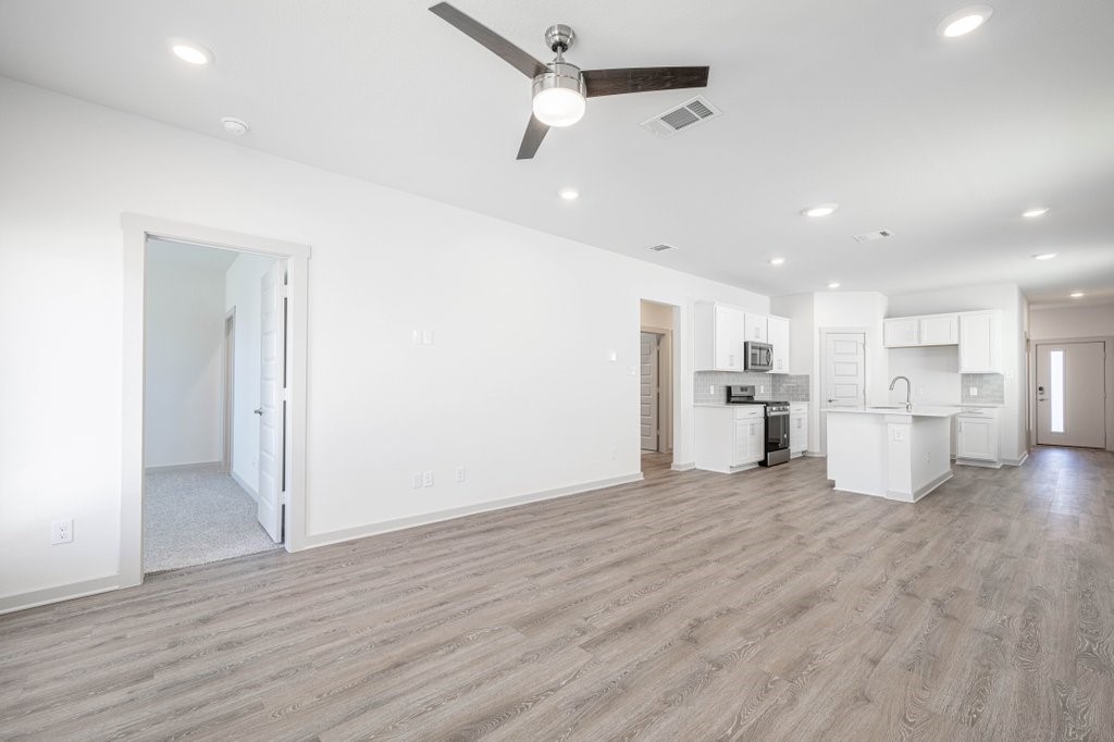 225 New Hampton Way San Marcos, TX 78666 - Photo 18 of 34 a view of kitchen with wooden floor