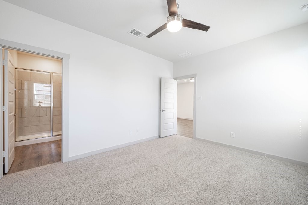 225 New Hampton Way San Marcos, TX 78666 - Photo 21 of 34 an empty room with fan and entrance