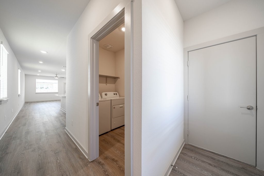 225 New Hampton Way San Marcos, TX 78666 - Photo 5 of 34 a view of hallway with wooden floor