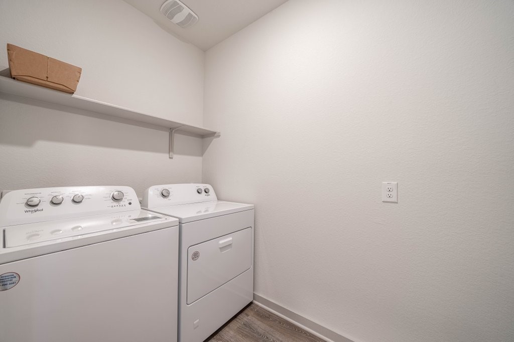 225 New Hampton Way San Marcos, TX 78666 - Photo 6 of 34 a view of storage and utility room with washer and dryer
