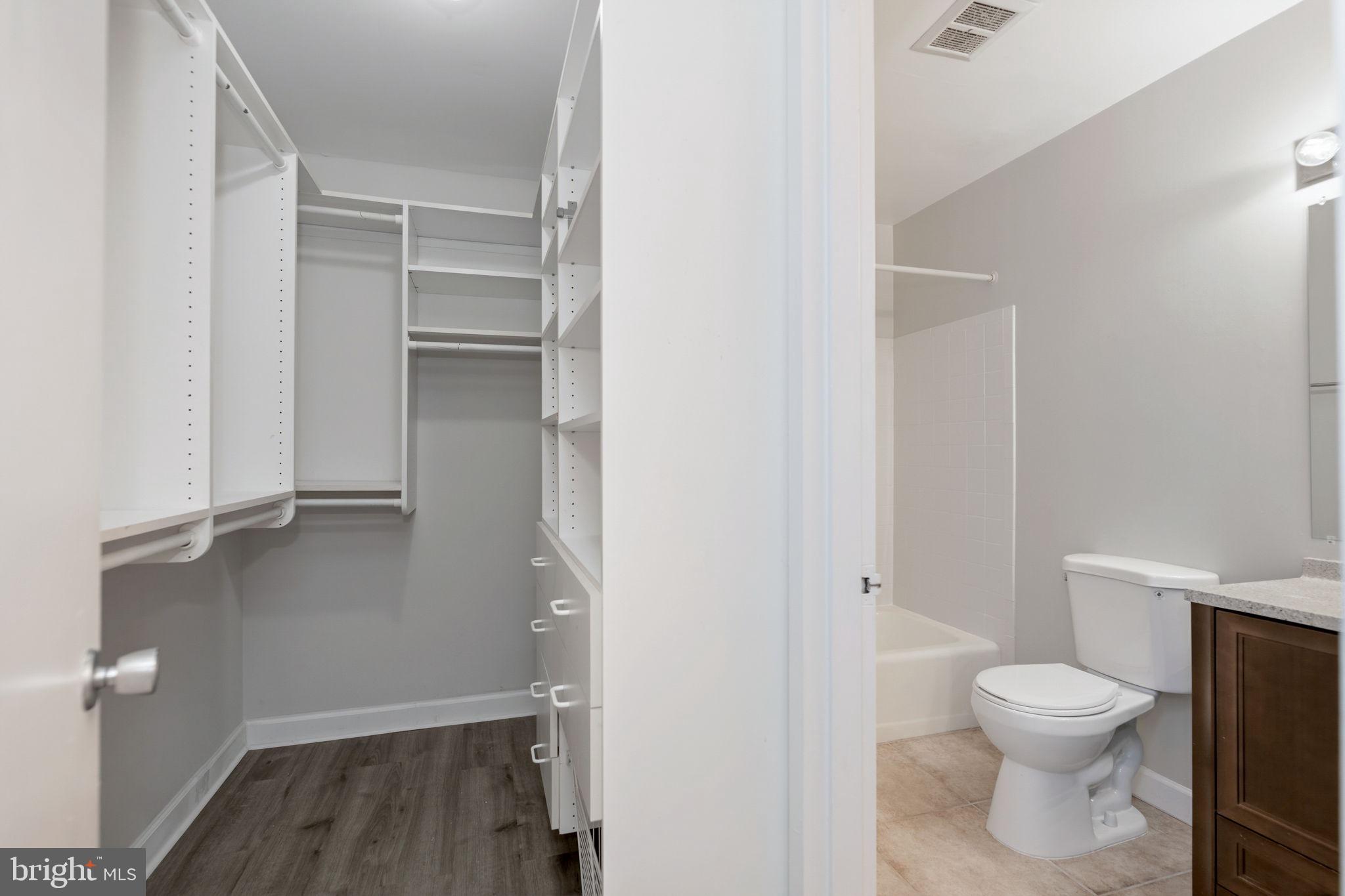 1443 Northgate Square, Unit 22B Reston, VA 20190 - Photo 21 of 42 a bathroom with a toilet and a shower