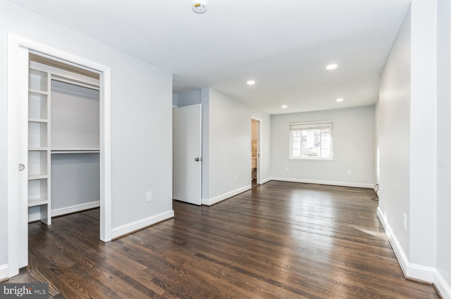 7016 Donna Circle Annandale, VA 22003 - Photo 12 of 30 an empty room with wooden floor and windows