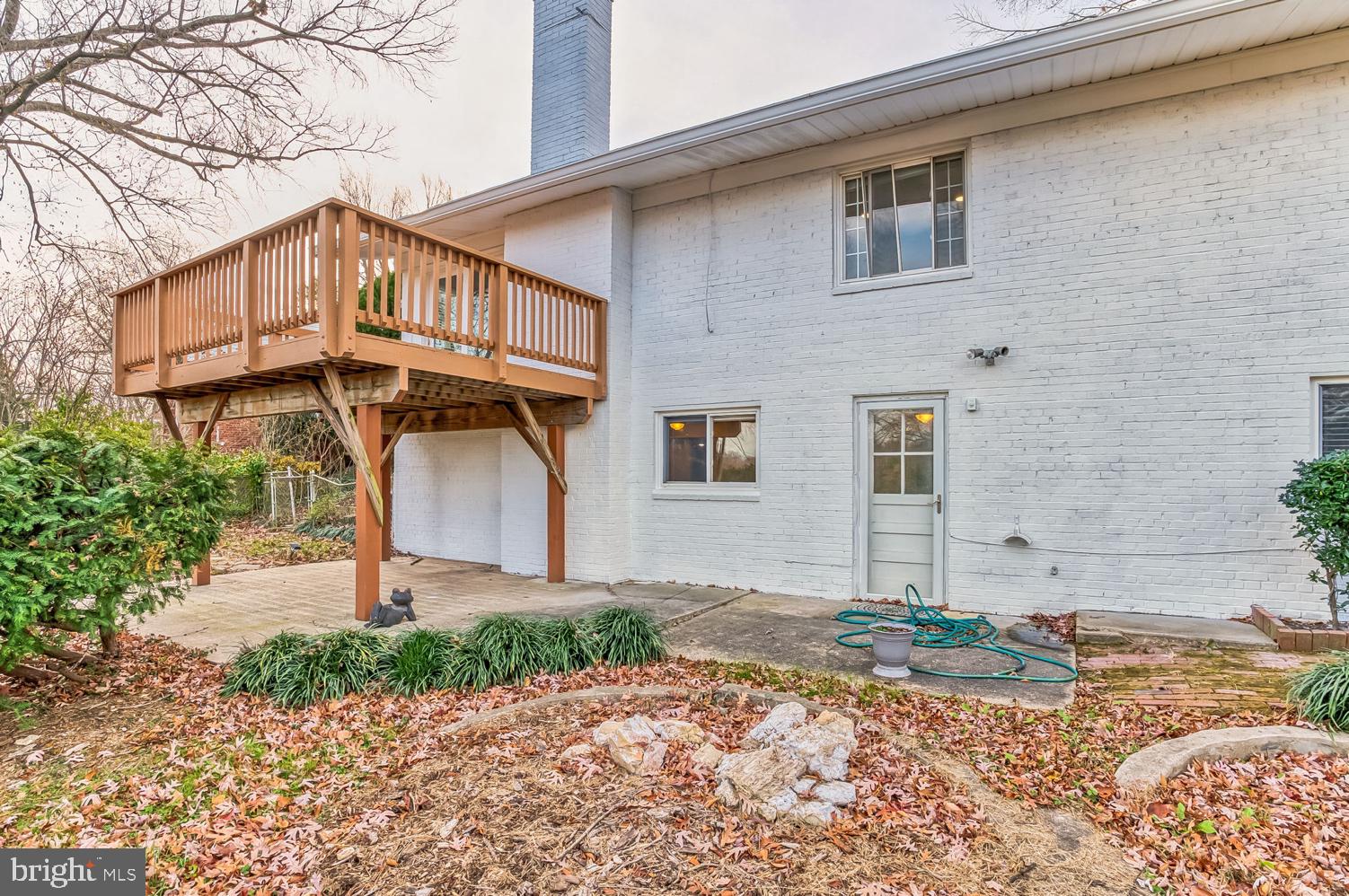 7016 Donna Circle Annandale, VA 22003 - Photo 25 of 30 a front view of a house with a yard and garage