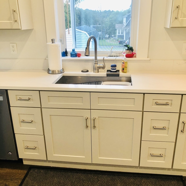 118 Chace Street Clinton, MA 01510 - Photo 16 of 41 a bathroom with a sink and a mirror
