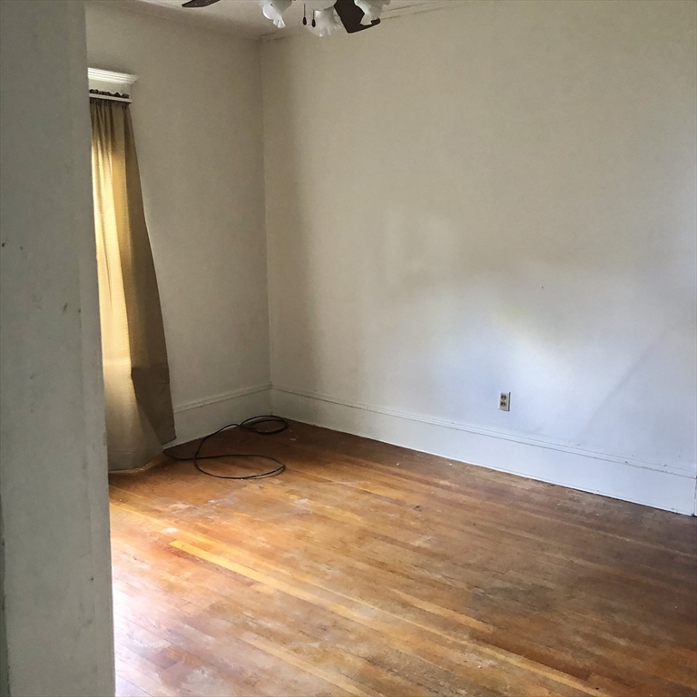 118 Chace Street Clinton, MA 01510 - Photo 35 of 41 an empty room with a window