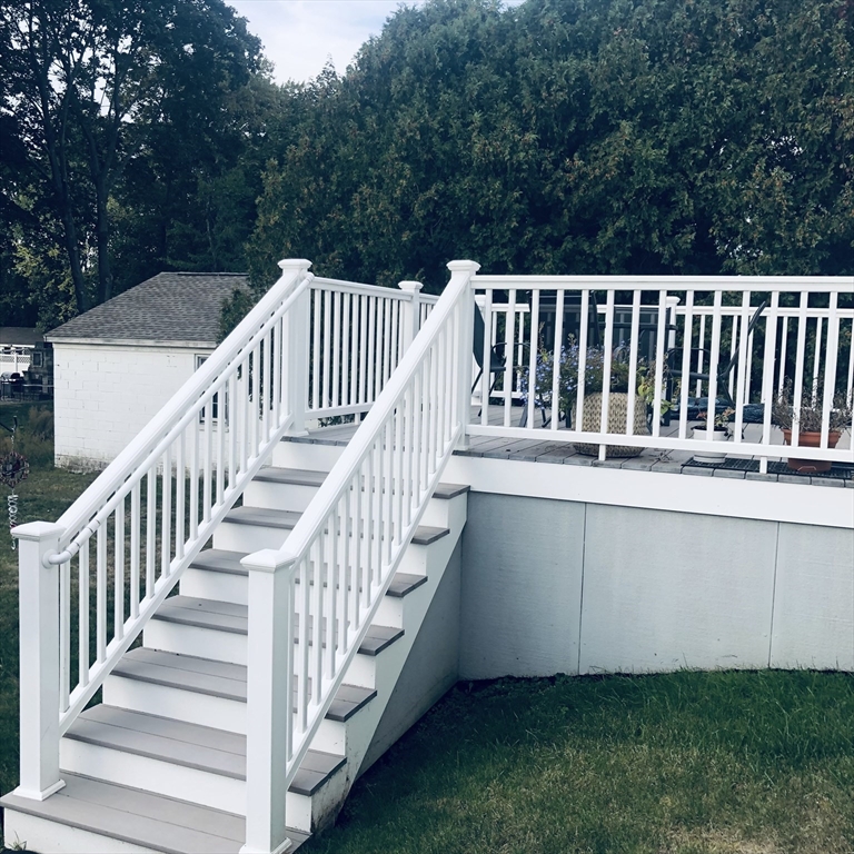 118 Chace Street Clinton, MA 01510 - Photo 8 of 41 a balcony with wooden floor