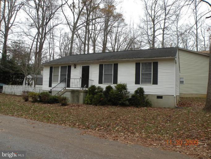 645 Willow Road Lusby, MD 20657 - Photo 1 of 7 Front of home