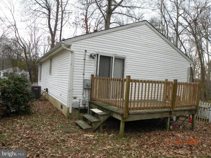 645 Willow Road Lusby, MD 20657 - Photo 2 of 7 Walkout slider with deck