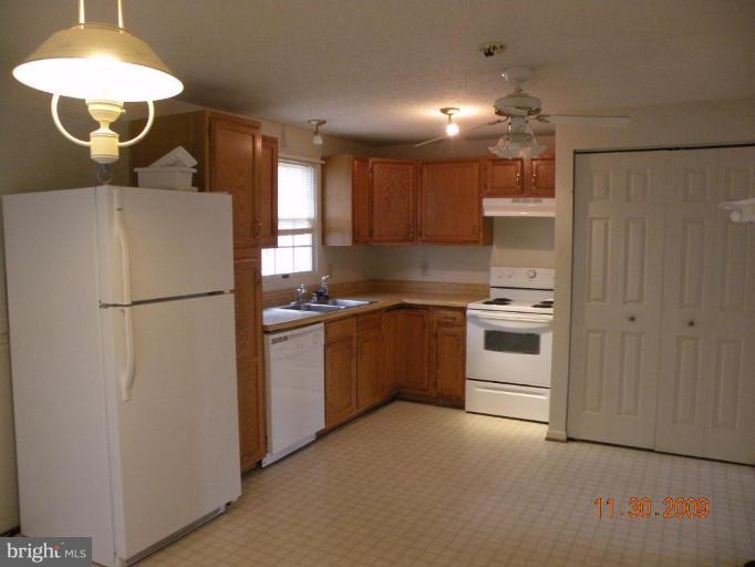 645 Willow Road Lusby, MD 20657 - Photo 4 of 7 Very nice kitchen area with lots of cabinets