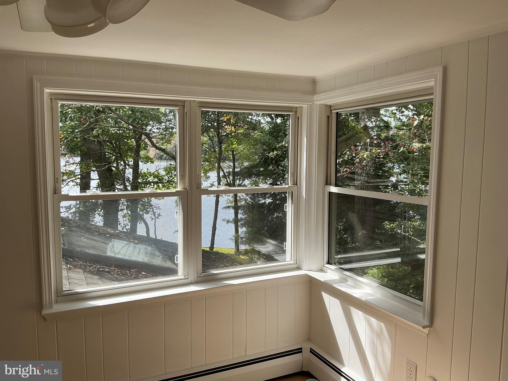 26 Silver Lake Road Clayton, NJ 08312 - Photo 13 of 15 a view of a room with a large window and wooden floor