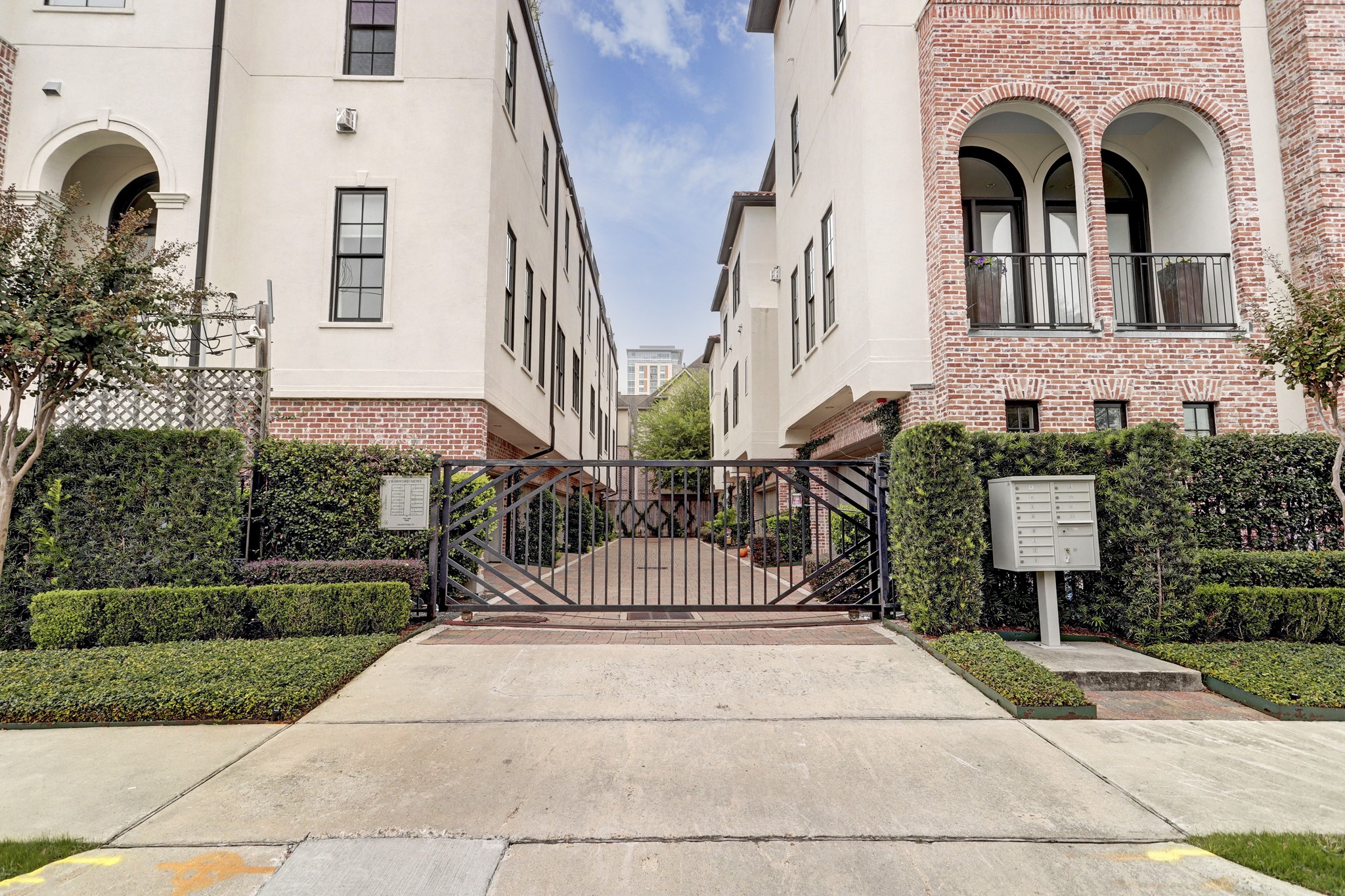 5218 Crawford Street Houston, TX 77004 - Photo 2 of 22 a front view of a house with a garden