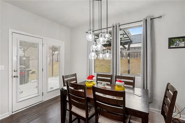a reading room with furniture wooden floor and a table