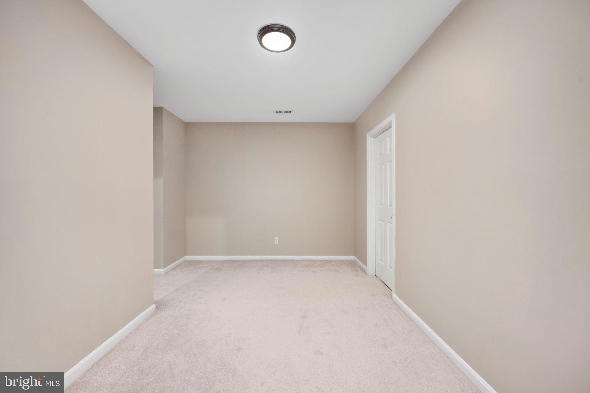 8 Riva Ridge Drive Stafford, VA 22556 - Photo 39 of 69 Lower level hallway to game room