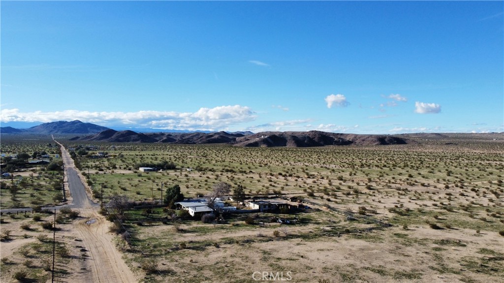 5 Sunflower Road Joshua Tree, CA 92252 - Photo 8 of 15 a view of a lake with mountains in the background