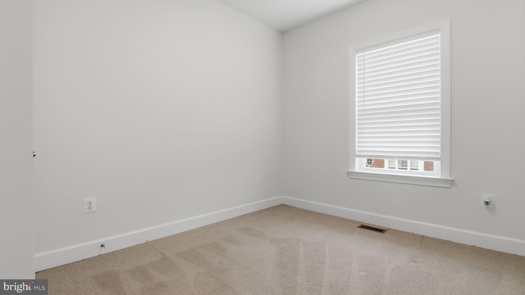 13806 Litespeed Way Gainesville, VA 20155 - Photo 12 of 22 an empty room with a window