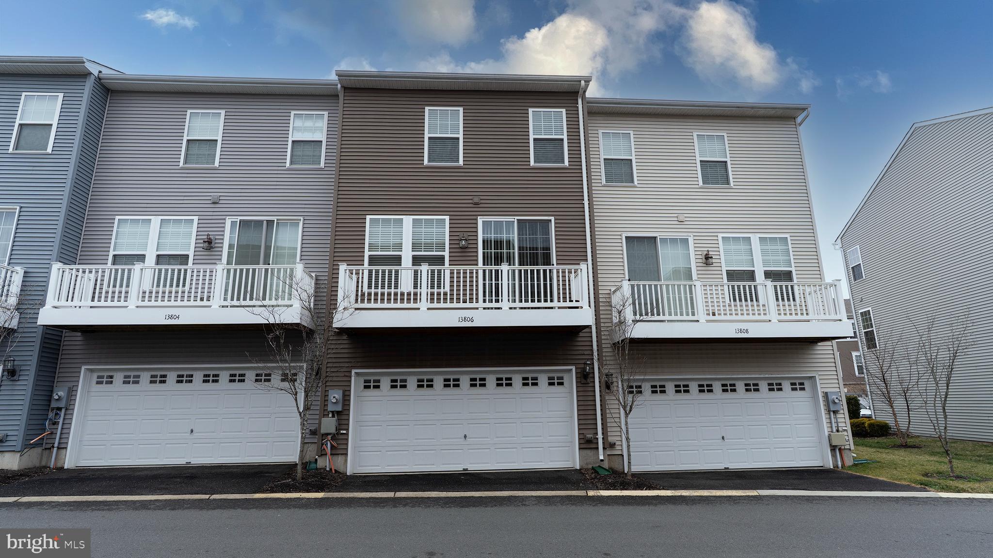 13806 Litespeed Way Gainesville, VA 20155 - Photo 2 of 22 a view of building with an outdoor space