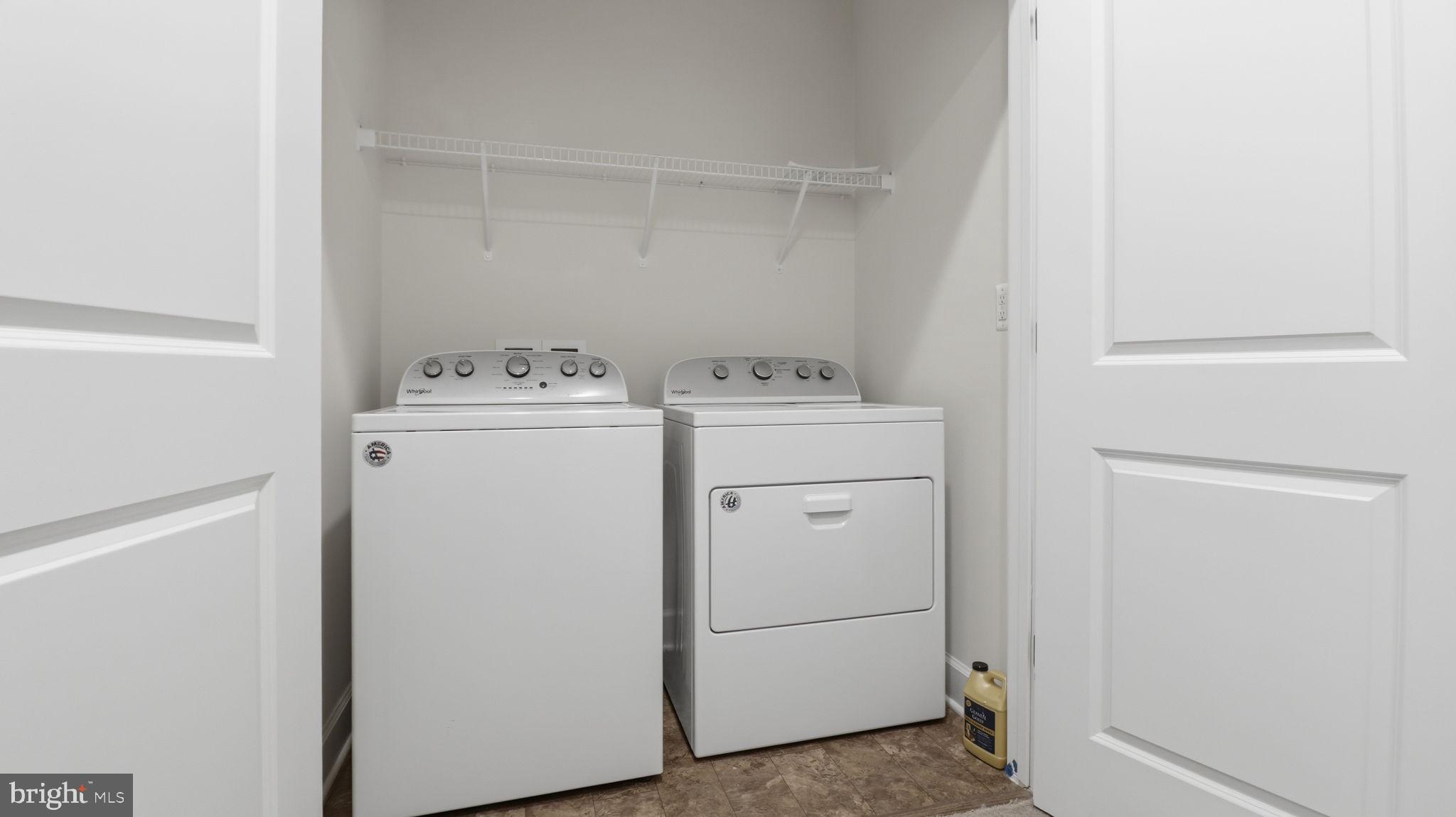 13806 Litespeed Way Gainesville, VA 20155 - Photo 22 of 22 a utility room with dryer and washer