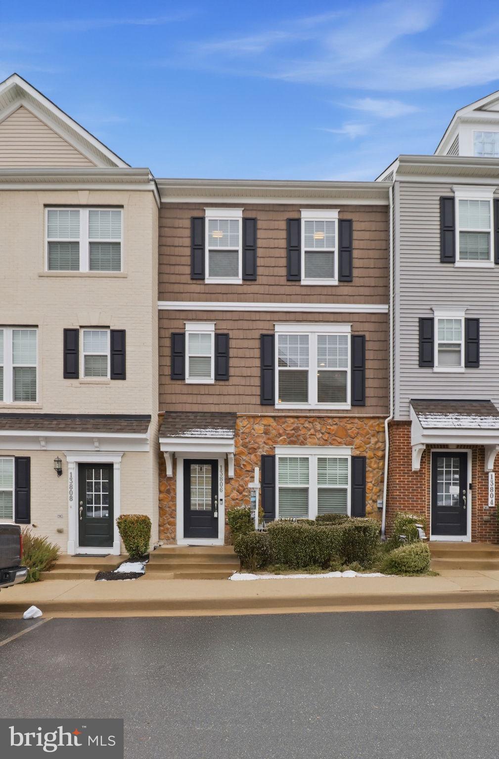 13806 Litespeed Way Gainesville, VA 20155 - Photo 5 of 22 a front view of a building