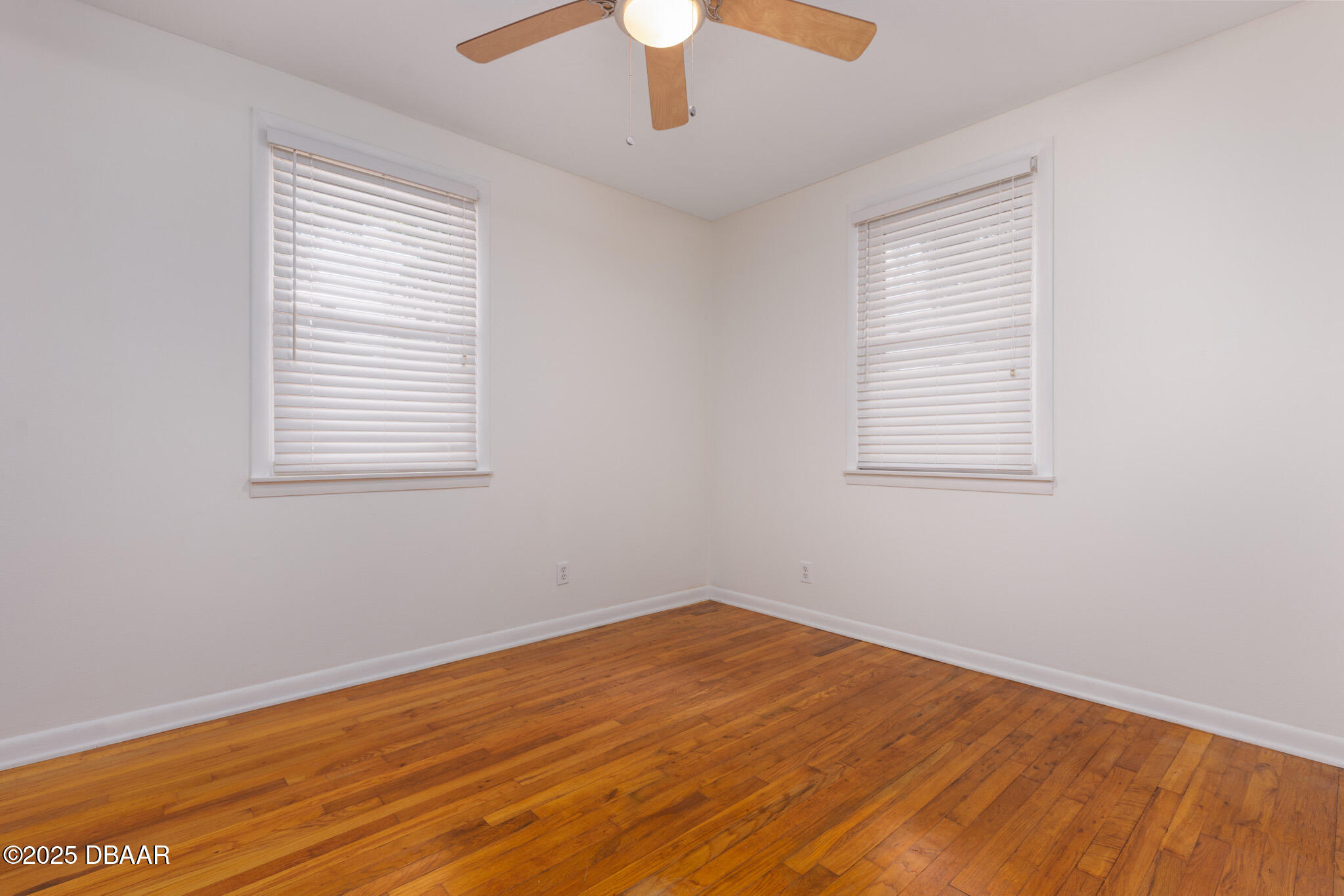 7915 Breezy Point Road East, Unit W Melrose, FL 32666 - Photo 12 of 36 an empty room with a window