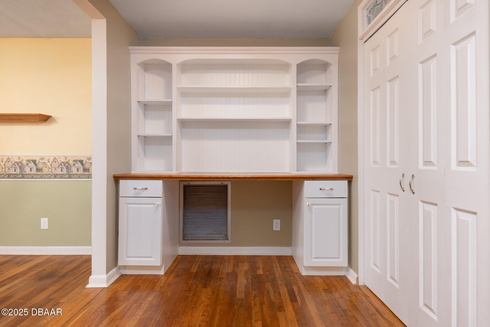 7915 Breezy Point Road East, Unit W Melrose, FL 32666 - Photo 15 of 36 a view of walk in closet with empty racks