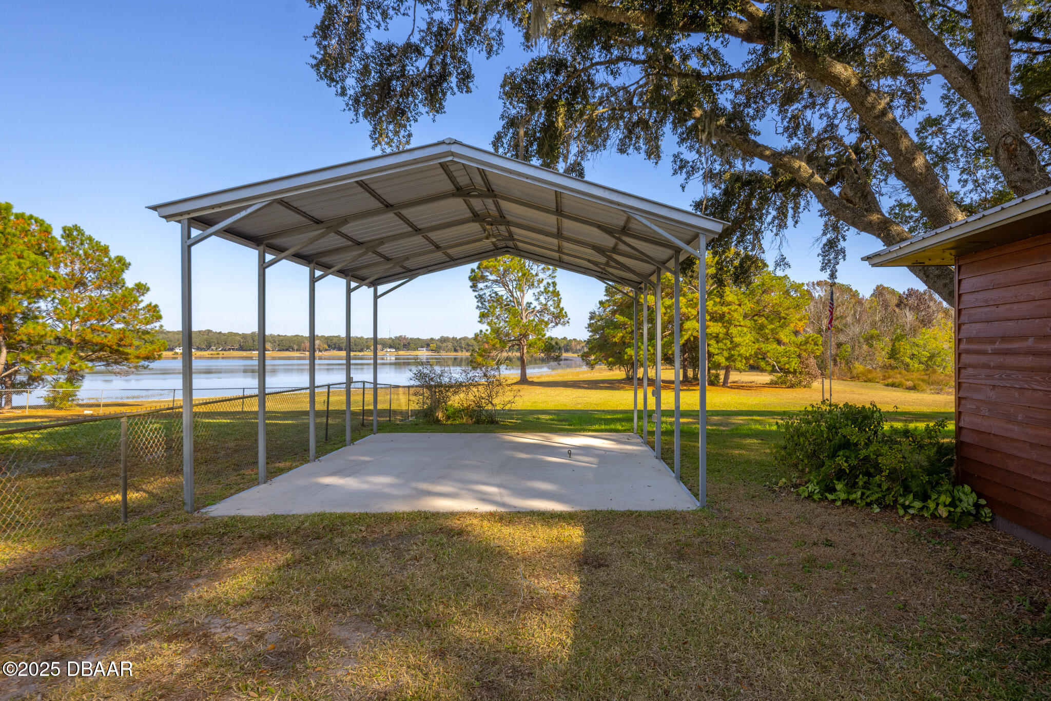 7915 Breezy Point Road East, Unit W Melrose, FL 32666 - Photo 16 of 36 a view of a park with slides