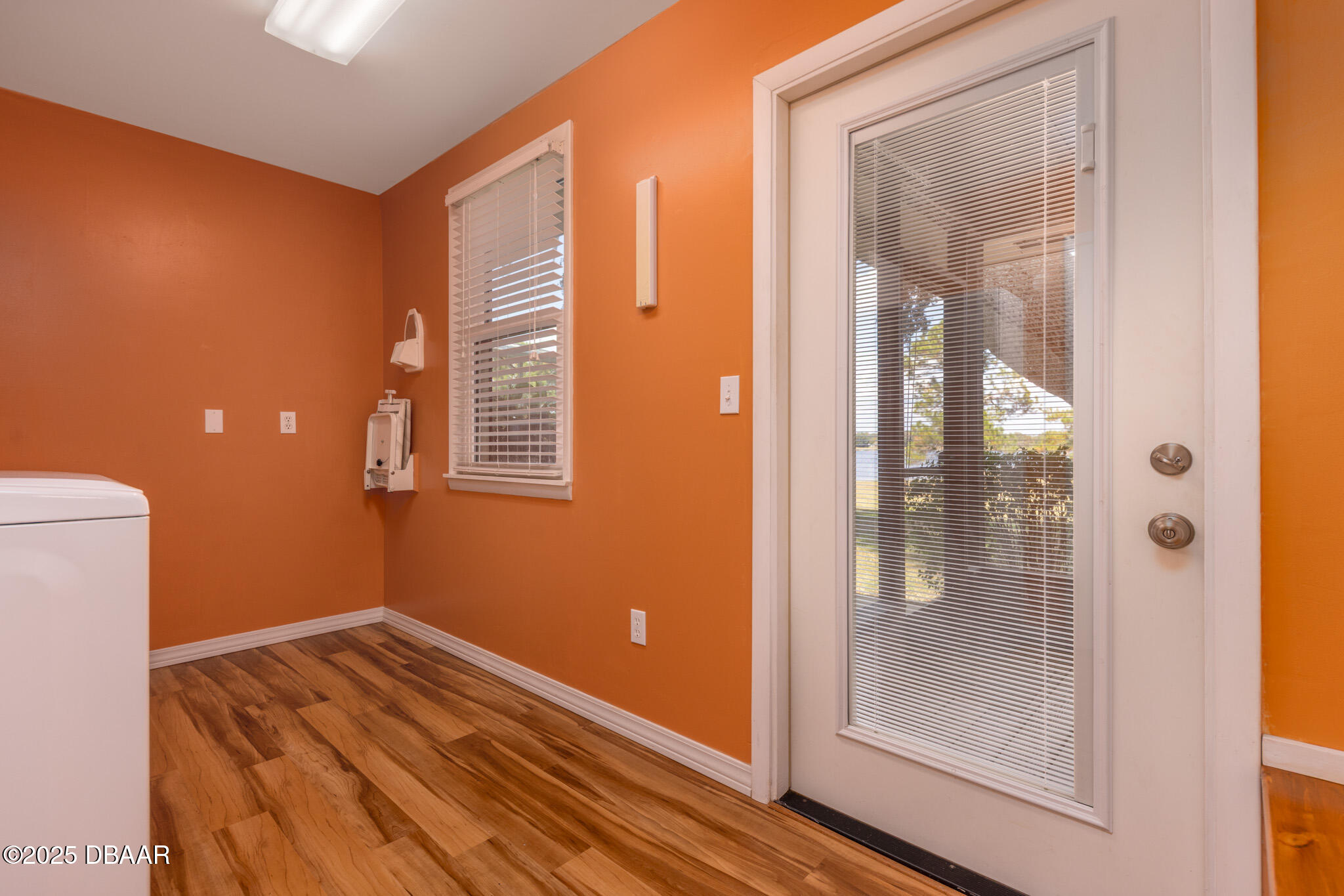7915 Breezy Point Road East, Unit W Melrose, FL 32666 - Photo 31 of 36 a view of a room that has a bed in it
