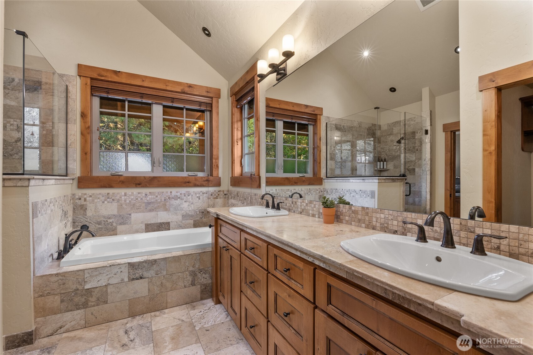 223 Cake Cle Elum, WA 98922 - Photo 18 of 33 a bathroom with a granite countertop tub sink and mirror