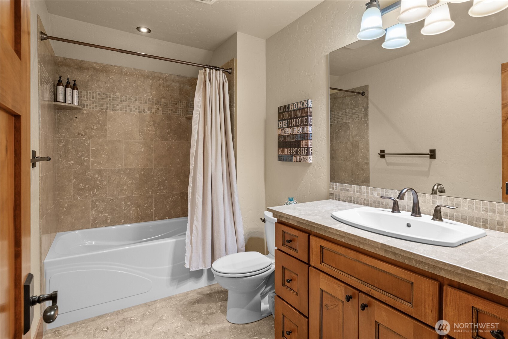 223 Cake Cle Elum, WA 98922 - Photo 22 of 33 a bathroom with a sink a toilet and shower