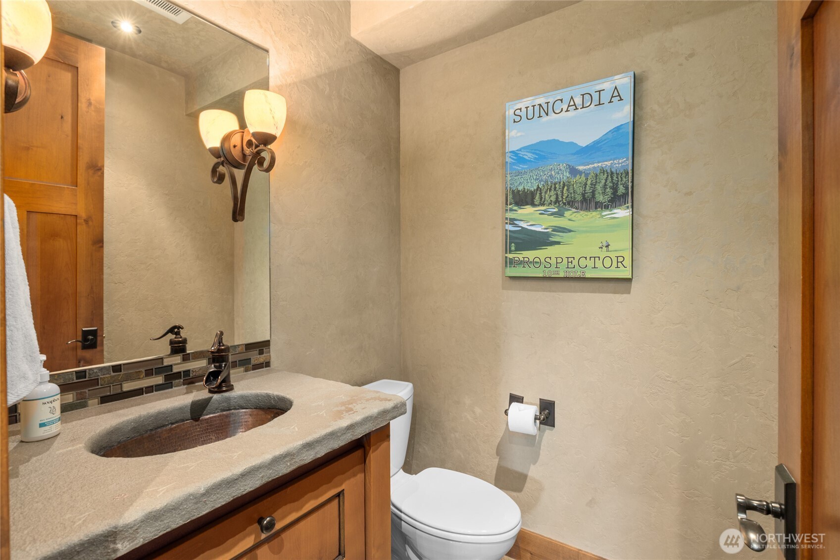 223 Cake Cle Elum, WA 98922 - Photo 27 of 33 a bathroom with a toilet sink and mirror