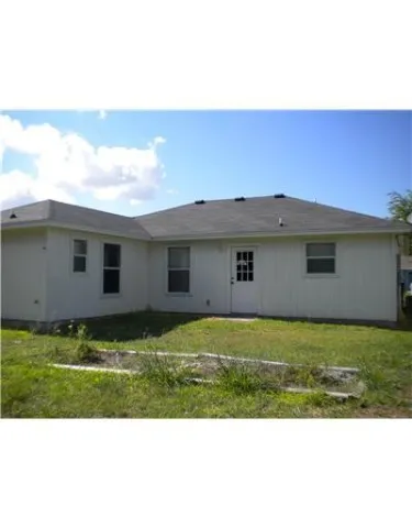 a view of outdoor space yard and front view of a house