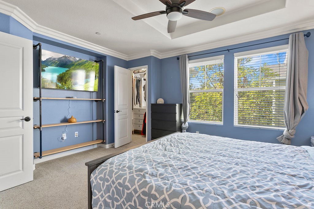 18 Triad Lane Ladera Ranch, CA 92694 - Photo 16 of 37 a bedroom with a bed and a flat screen tv