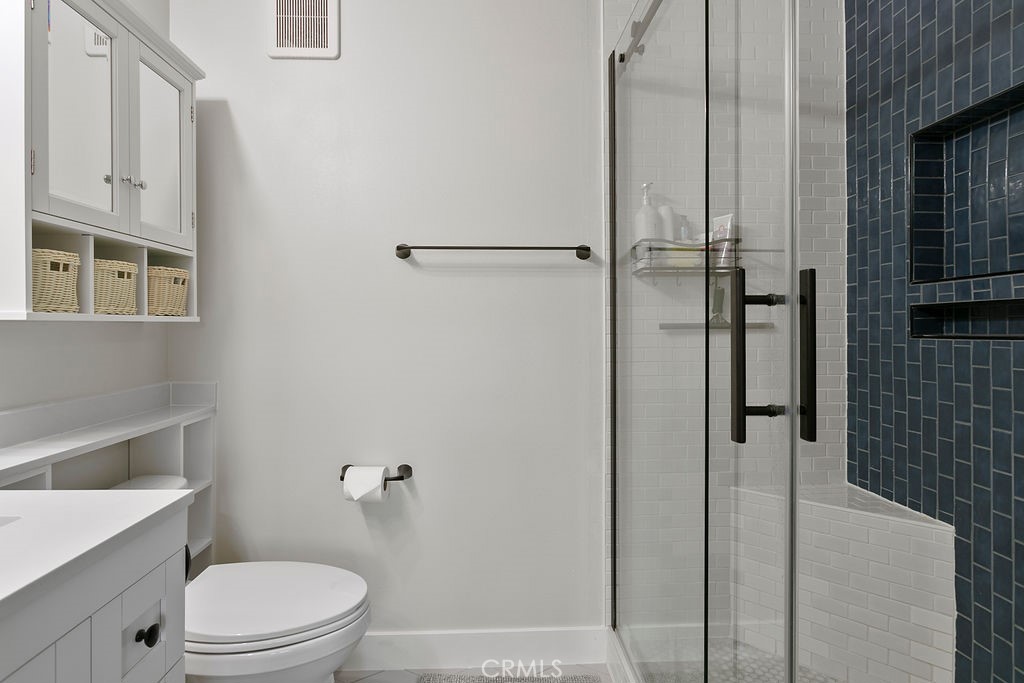 18 Triad Lane Ladera Ranch, CA 92694 - Photo 18 of 37 a bathroom with a toilet and a shower