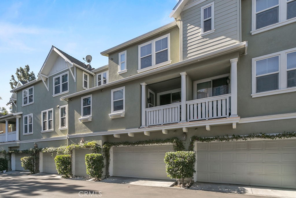 18 Triad Lane Ladera Ranch, CA 92694 - Photo 24 of 37 a front view of a house with a garden