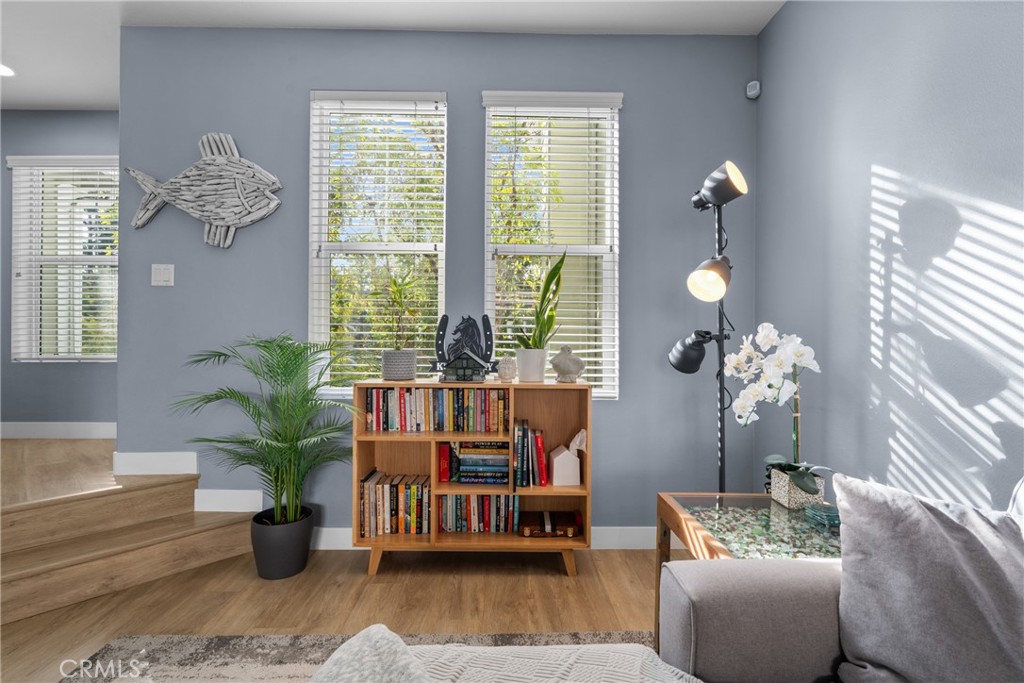 18 Triad Lane Ladera Ranch, CA 92694 - Photo 28 of 37 a living room with furniture flowerpot and wooden floor