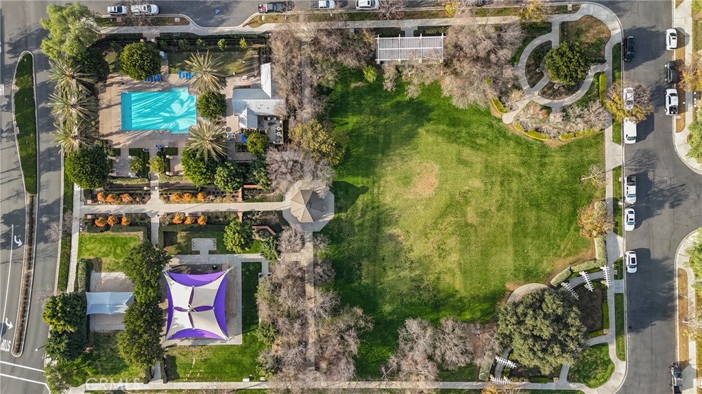 18 Triad Lane Ladera Ranch, CA 92694 - Photo 30 of 37 an aerial view of a residential apartment building with a yard and plants