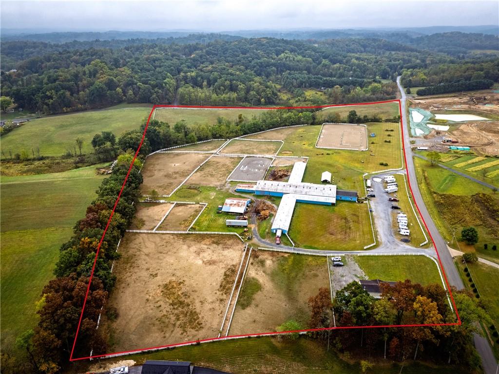 332 Overbrook Road Valencia, PA 16059 - Photo 15 of 50 an aerial view of a house with a garden and lake view