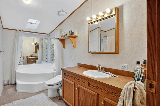 a view of workspace with furniture and window