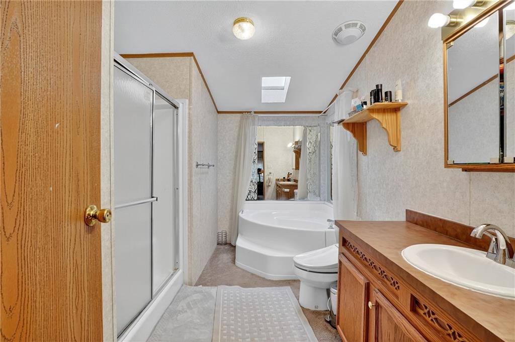 332 Overbrook Road Valencia, PA 16059 - Photo 44 of 50 a spacious bathroom with a sink a toilet and shower