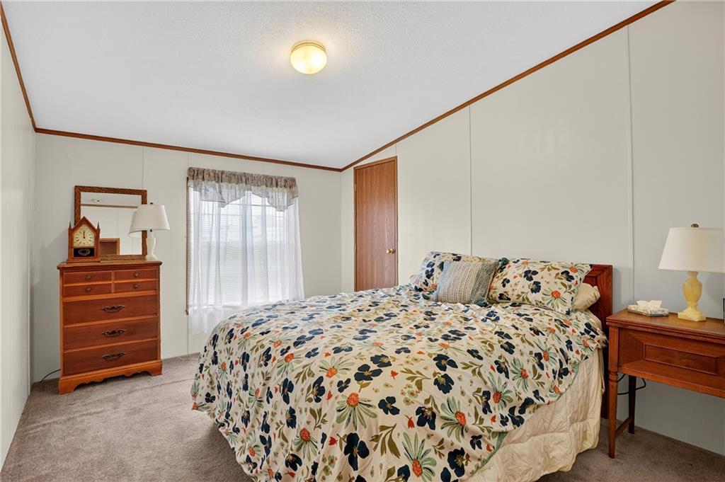 332 Overbrook Road Valencia, PA 16059 - Photo 45 of 50 a bedroom with a bed and a closet